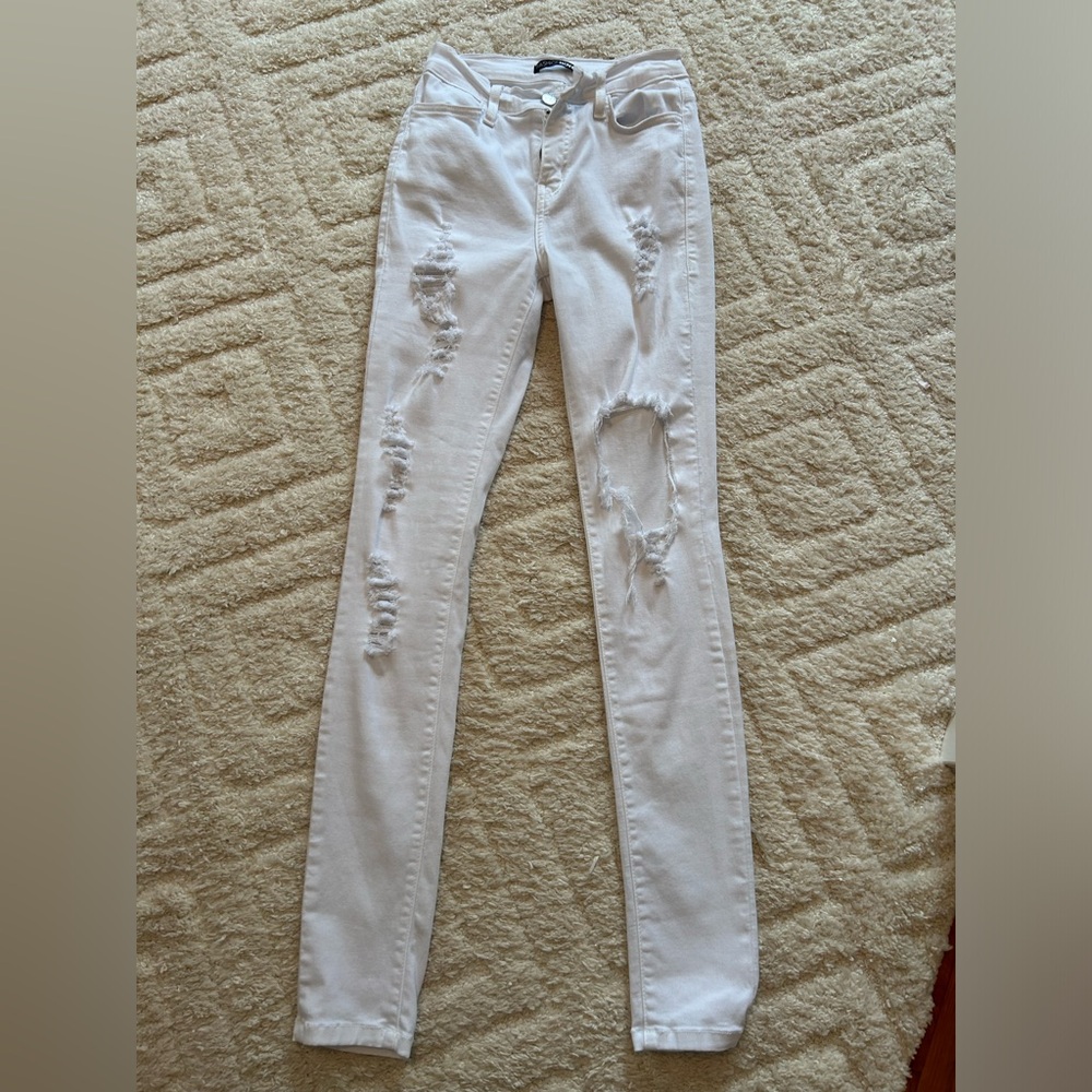 White ripped jeans